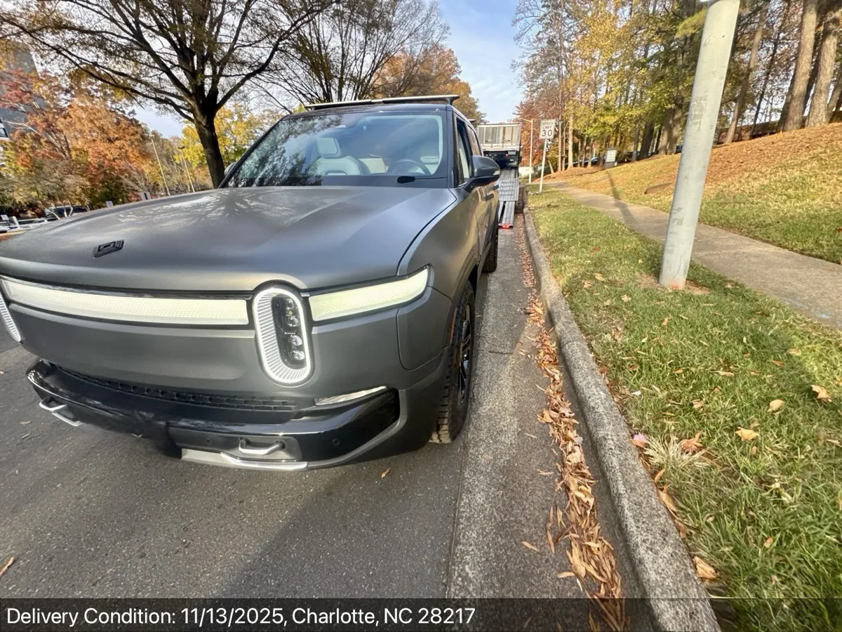 Rivian R1T delivered to a Charlotte, NC neighborhood with fall foliage