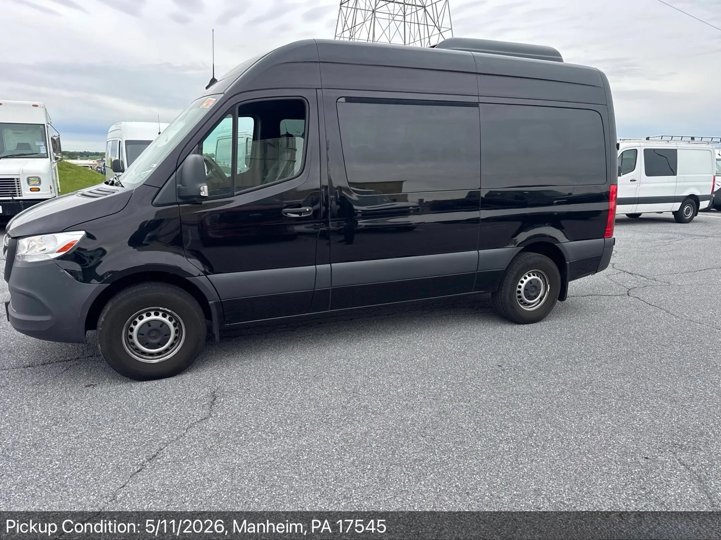 Black high-roof Mercedes Sprinter van at pickup-condition inspection in Manheim, Pennsylvania