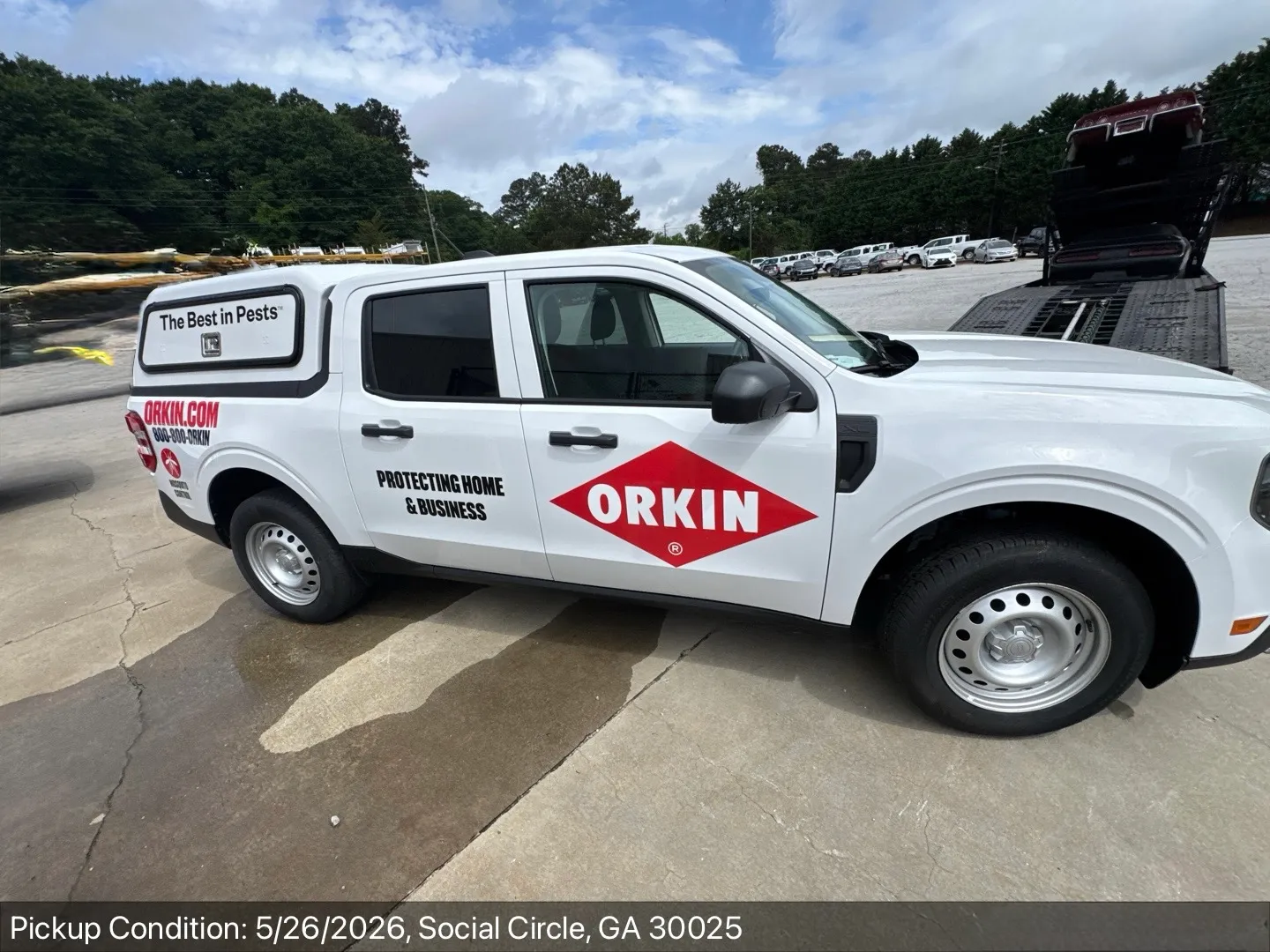 Branded commercial service pickup at pickup-condition inspection on a carrier lot in Social Circle, Georgia